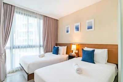 Estudio con 2 camas individuales y vistas al jardín — Wyndham Phuket Airport